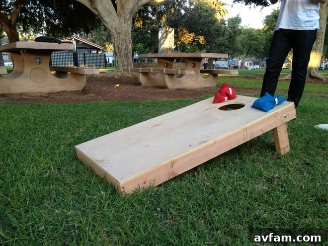 Friends Playing Cornhole Happy Players Enjoying Custom Cornhole Boards