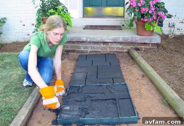 Quikrete Walk Maker creating a beautiful DIY paver walkway in a garden setting