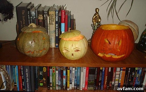 A close-up on a vintage-inspired Halloween prop, possibly a creepy mask or a unique sculpture, highlighting Gubler's eclectic taste.