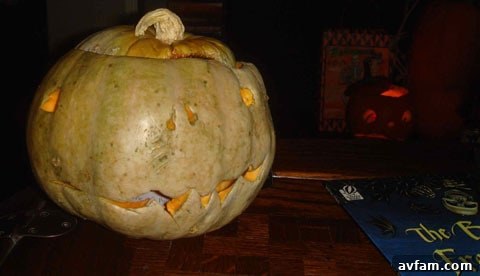 Matthew Gray Gubler carefully selecting natural Halloween elements like cornstalks and pumpkins to enhance his unique home decorations.