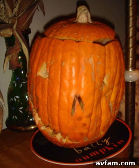 A window or doorway in Gubler's home draped with elaborate spiderwebs and perhaps a lurking figure, enhancing the haunted atmosphere.