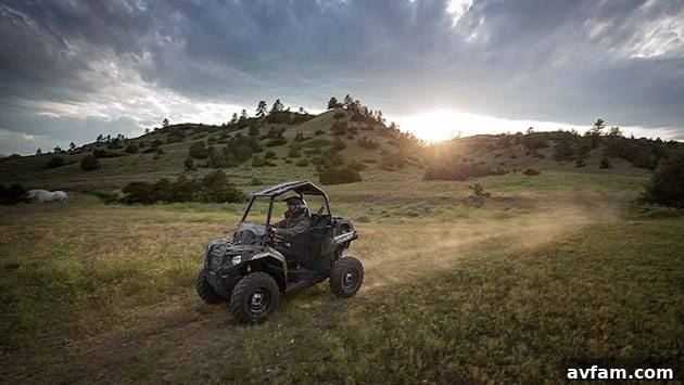 polaris-ace-sunset - The Polaris ACE silhouetted against a vibrant sunset, evoking a sense of adventure and the freedom of the open trail.