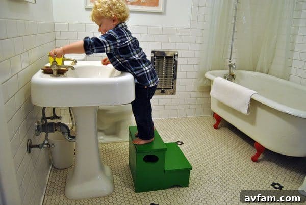 Child-friendly storage step stool for bathroom independence