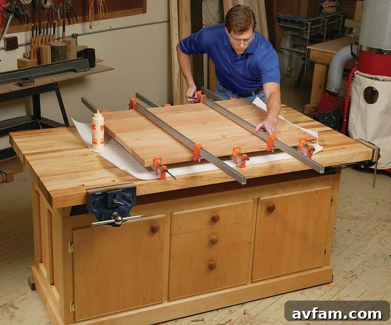 Woodworking workbench with integrated storage drawers and spacious top