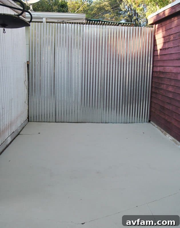 Final wide shot of the completely transformed patio, showcasing the uniform and refreshed surface achieved with Olympic Rescue It