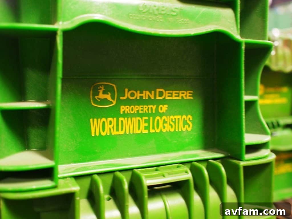 Lifting and inspecting John Deere tractors for structural integrity John Deere D100 series on a durability hoist