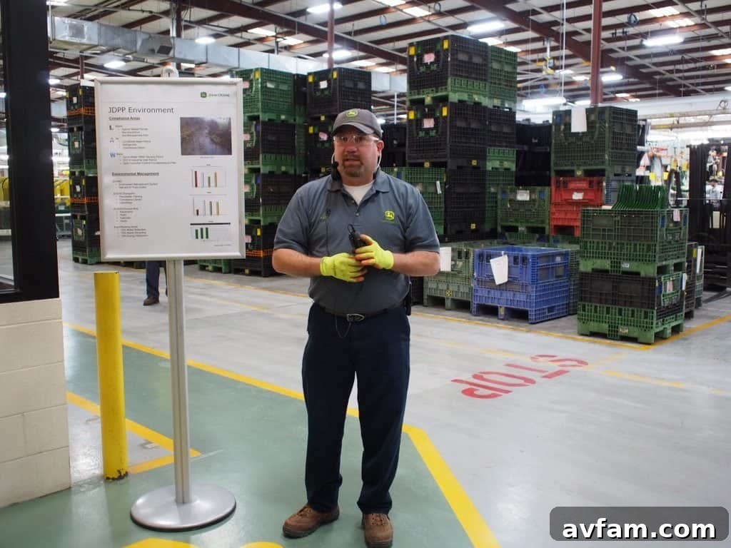 Skilled technicians performing critical welds Welding station on the John Deere assembly line