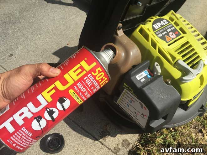 Understanding Ethanol's Impact on Small Engines Close-up of a small engine fuel tank with a clear view of the fuel inlet, emphasizing the importance of proper fuel choice for outdoor power equipment like lawnmowers, blowers, and chainsaws.