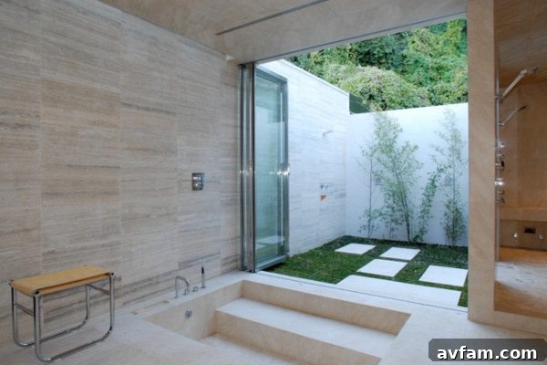 Modern minimalist outdoor shower with dark siding