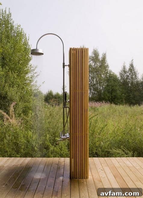Compact outdoor shower with dark wood panels and small footprint