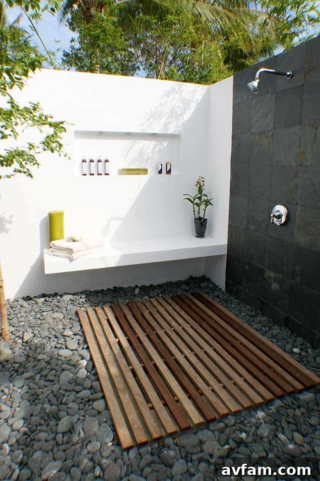 Outdoor shower with sleek modern design and dark slatted wood
