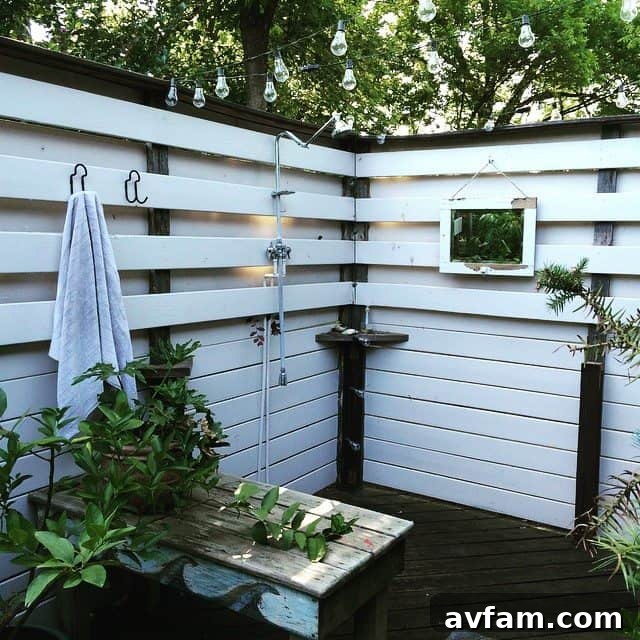 Outdoor shower with white corrugated metal and wood floor
