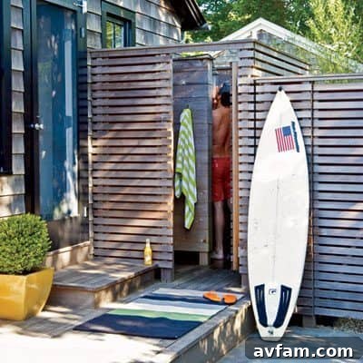 Compact outdoor shower with dark wood slats for privacy