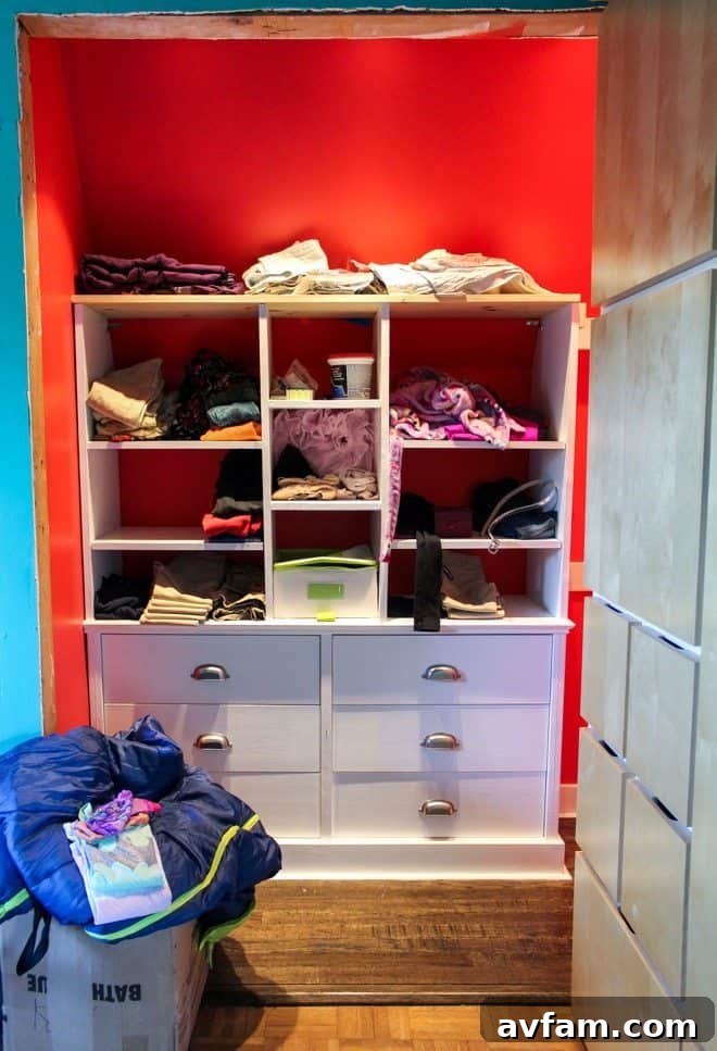 Unfinished built-in closet system in a child's room