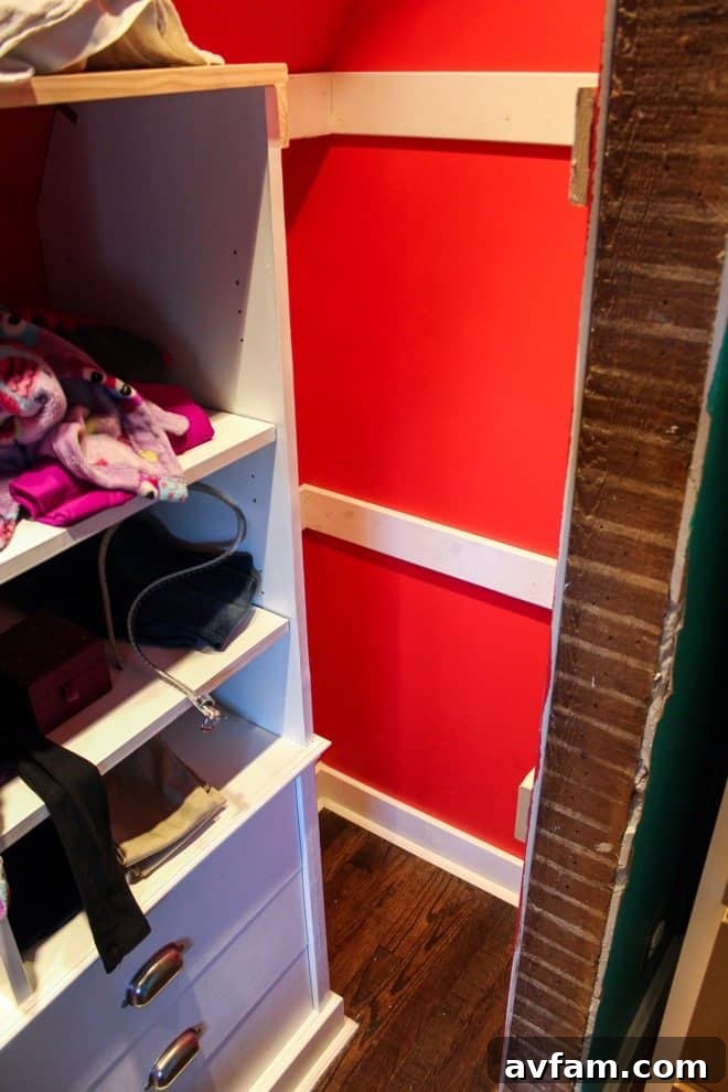Close-up of the small, confined space in the closet requiring work