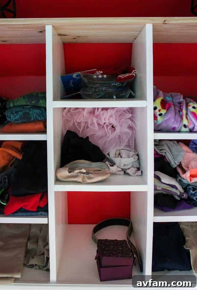 Kids' closet shelves now cleared of tools and repurposed for sports gear and daily accessories, creating more floor space.