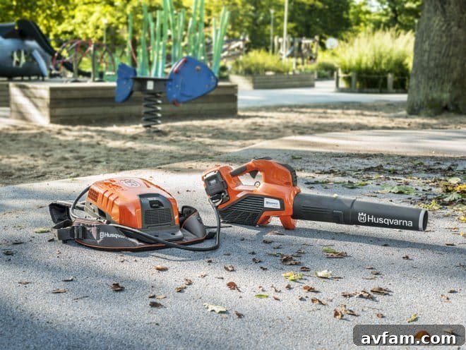 Husqvarna 536LiBX battery blower with backpack battery in park setting