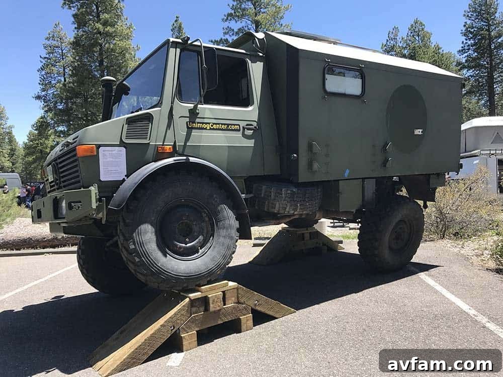 A unique overland build resembling a utility vehicle, customized with a canopy and various expedition accessories.