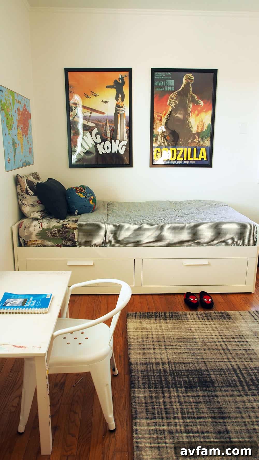 After painting: View into a contemporary bedroom with light walls and minimalist decor