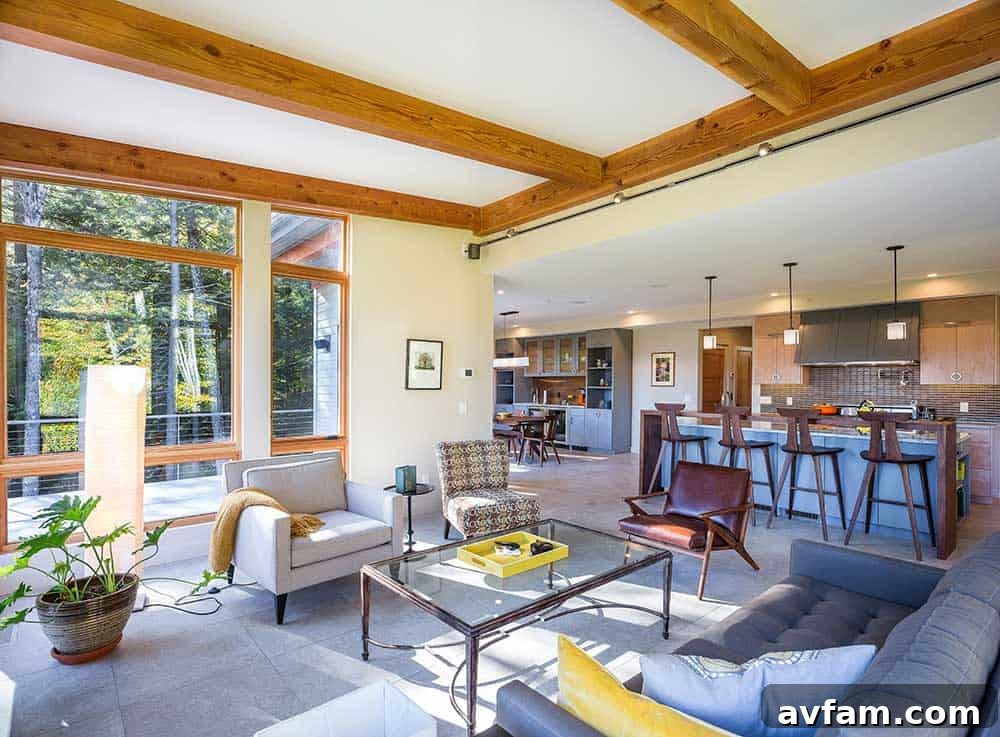 Open staircase connecting floors in the Mad River Modern, showcasing post and beam details