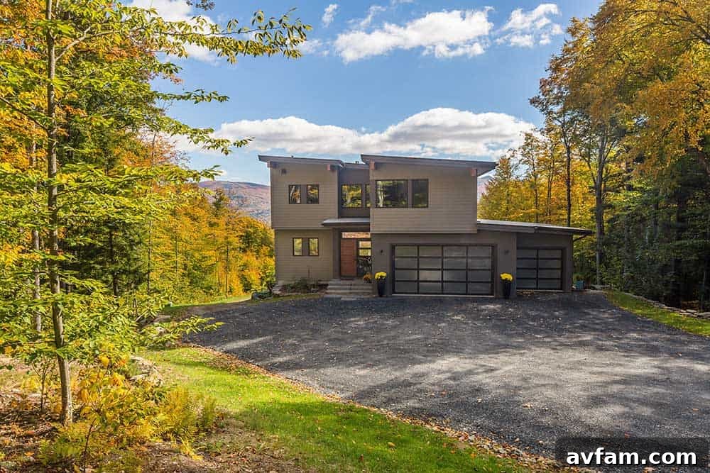 Mad River Modern living room with expansive views and exposed timber