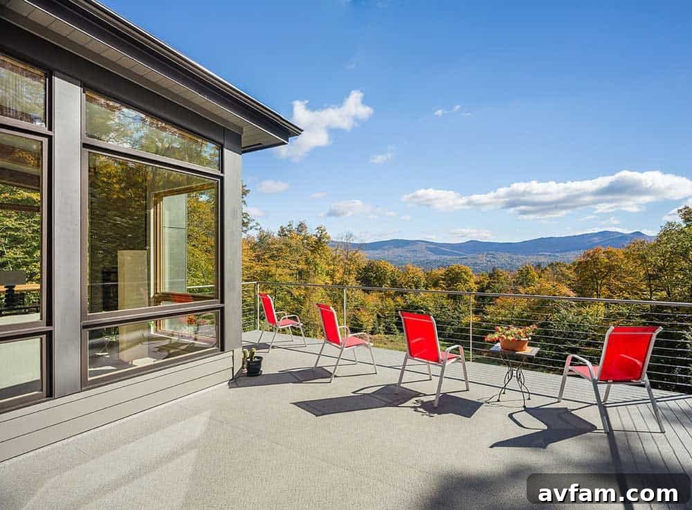 Expansive deck overlooking a serene natural landscape from the Mad River Modern