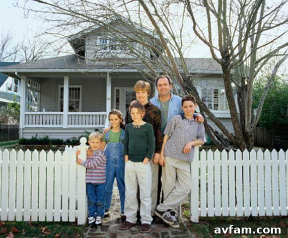 Happy homeowners enjoying their newly renovated home
