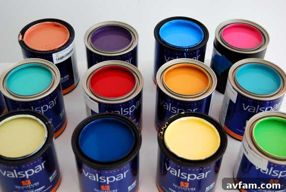 Valspar Paint Lowes A close-up of Valspar paint cans and color swatches at Lowes.
