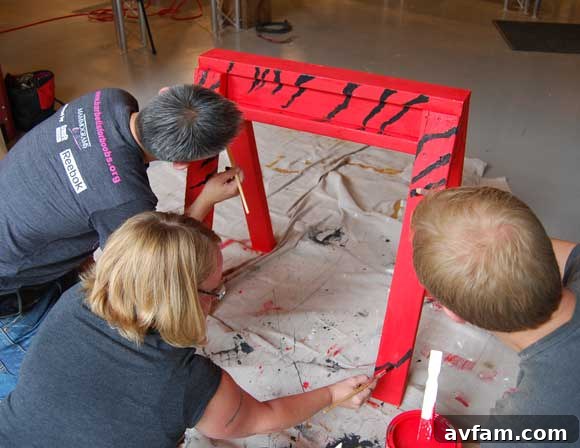 Creatively painted sawhorses showcasing artistic flair at the Craftsman event