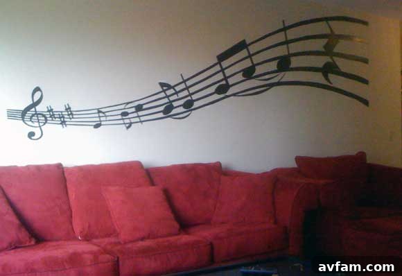 Completed music-themed wall mural, showcasing the final painted design with clean lines and vibrant colors.