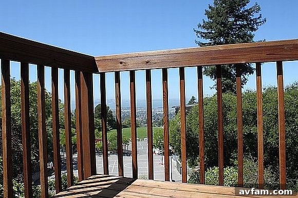 From Grime to Gleam: Pressure Washing Transformations 3 After Power Washing: A Restored, Vibrant Redwood Deck, Like New