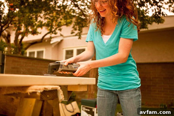 Child Sanding Wood with a Dremel Multi-Max Tool