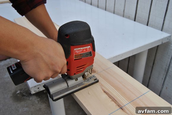Milwaukee M12 Jigsaw performing a precise cut in wood
