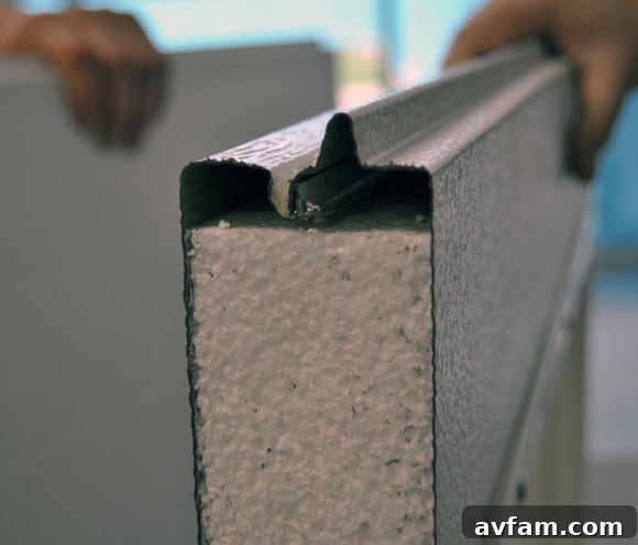 Foam material being prepared for insulation in garage doors.