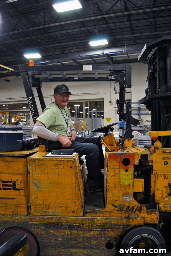Ali, a long-serving Clopay employee, operating a forklift.