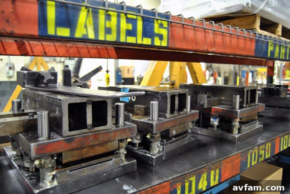 Various dies and molds used in garage door manufacturing.