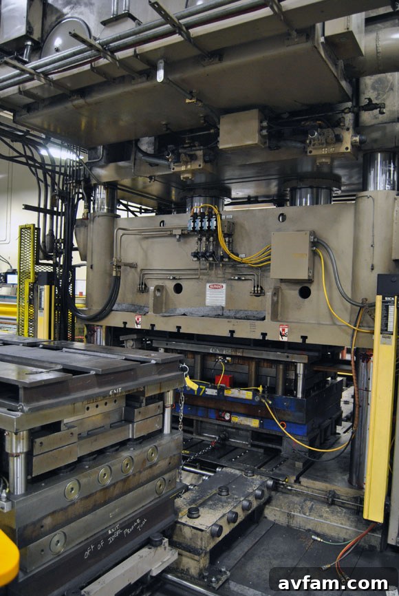 A large hydraulic press used in shaping metal for garage doors.