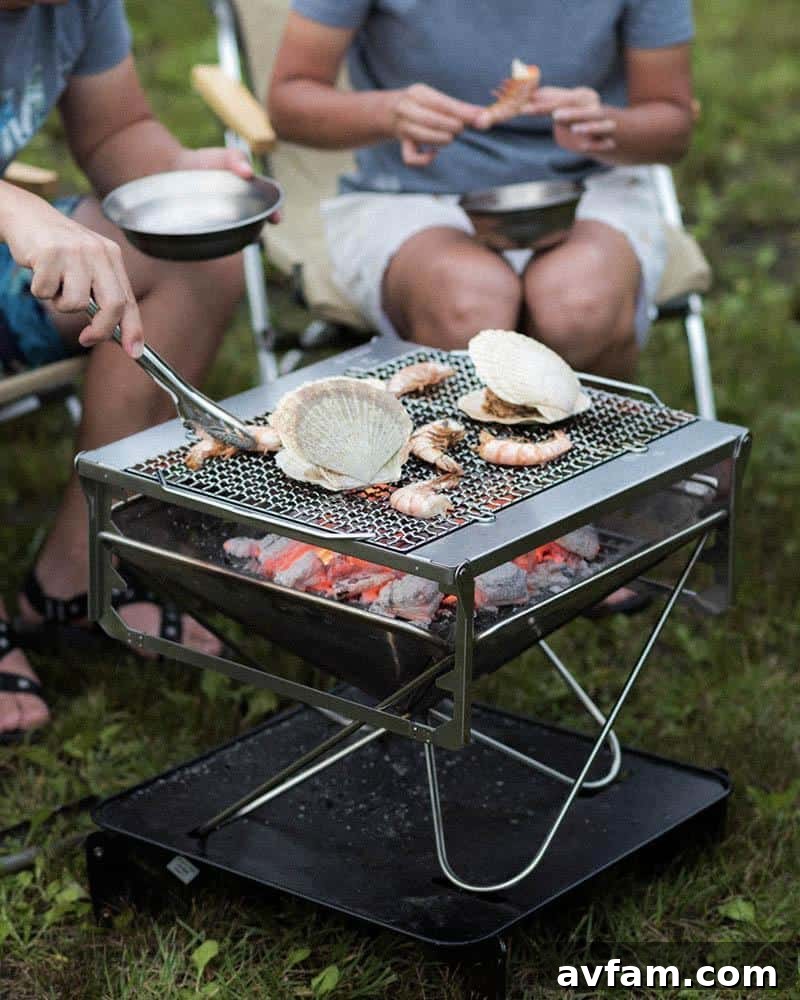 Snow Peak Takibi Fire and Grill Snow Peak Takibi Fire and Grill in use, showcasing its sleek design and functionality