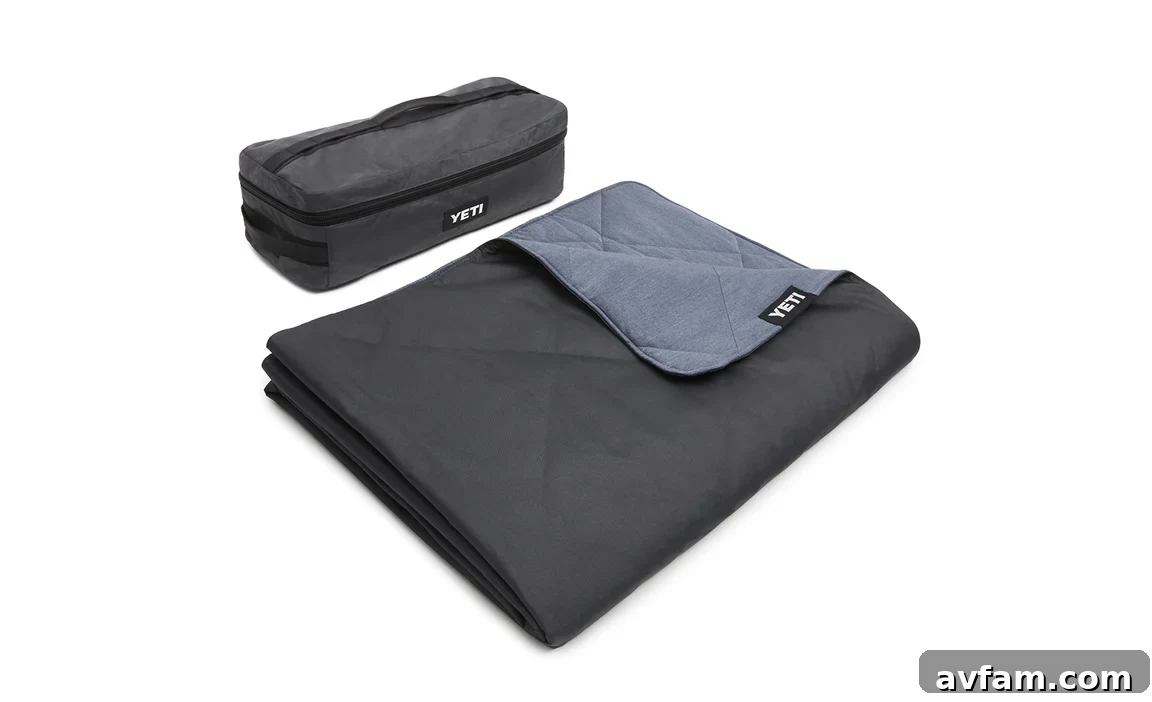 YETI Lowlands Blanket YETI Lowlands Blanket spread out on grass, ready for outdoor relaxation