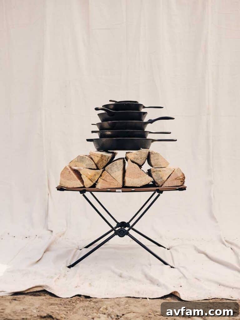 Filson Helinox Tactical Hard Top Table set up in a lush forest camp