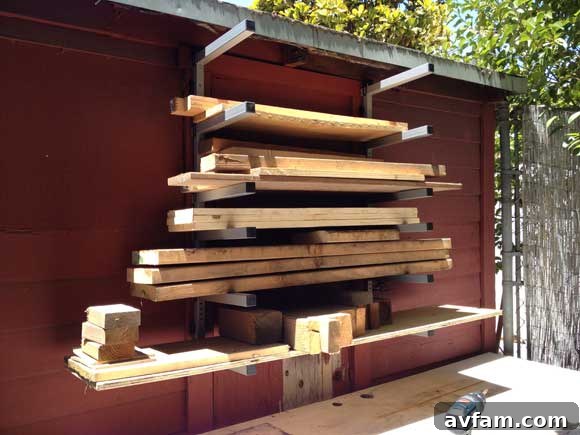 Cluttered backyard with scattered dimensional lumber before organization