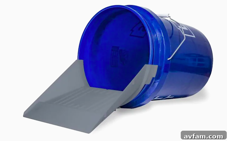 Close-up view of the Quiklid scoop's robust grey recycled plastic construction, highlighting its durability and straightforward design.