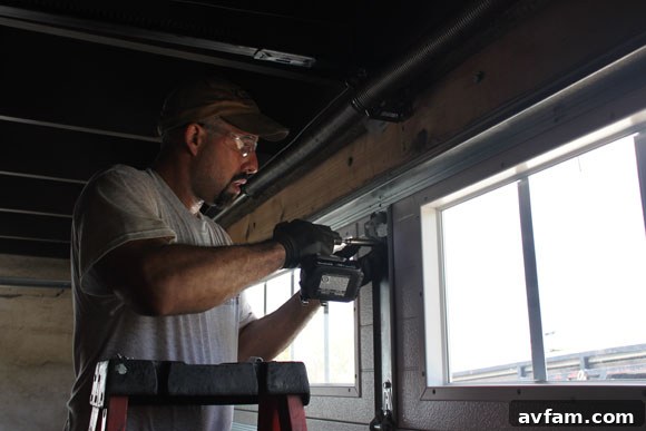 Mike from Kaiser Garage Door Installing New Panels