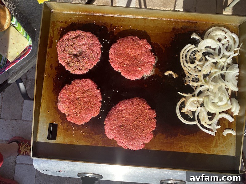 Operating knobs and dual burners of the Char-Broil griddle.