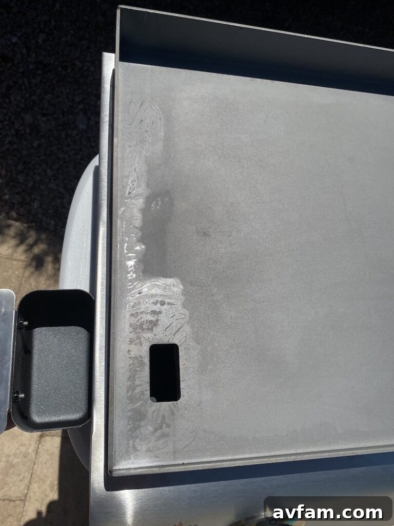 Grease management system of the Char-Broil outdoor griddle.