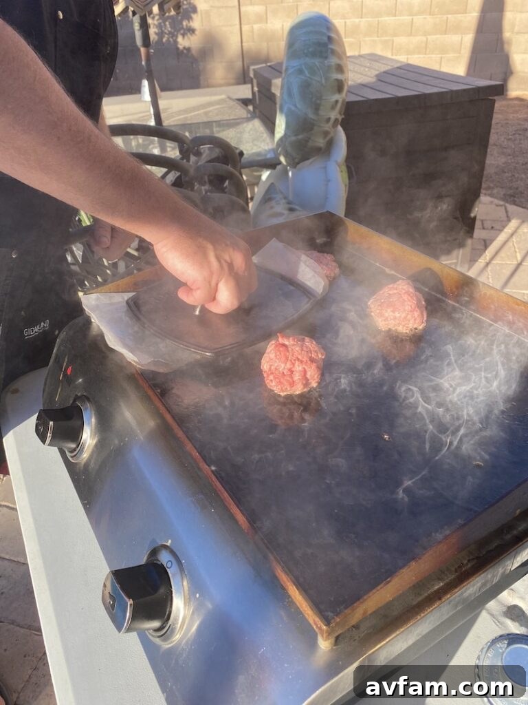 Delicious smash burgers cooked to perfection on the Char-Broil griddle.