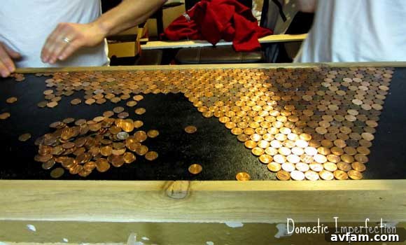 Artistic arrangement of pennies on the countertop