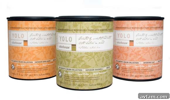 Various paint cans neatly stacked, representing a wide range of color choices.