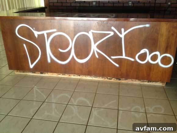 Residential Vandalism Aftermath Extensive spray paint graffiti damaging interior walls of a Las Vegas home