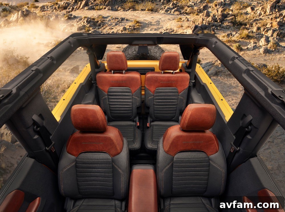 The Ford Bronco with its roof and doors removed, offering a completely open-air experience.